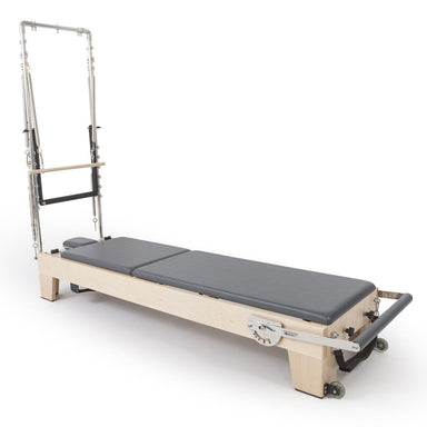 Elina Pilates Elite Wood Reformer with Tower and Bundle, handcrafted rock maple frame with a stainless steel tower and stackable design for professional studios, official authorized dealer The Kind Motion.