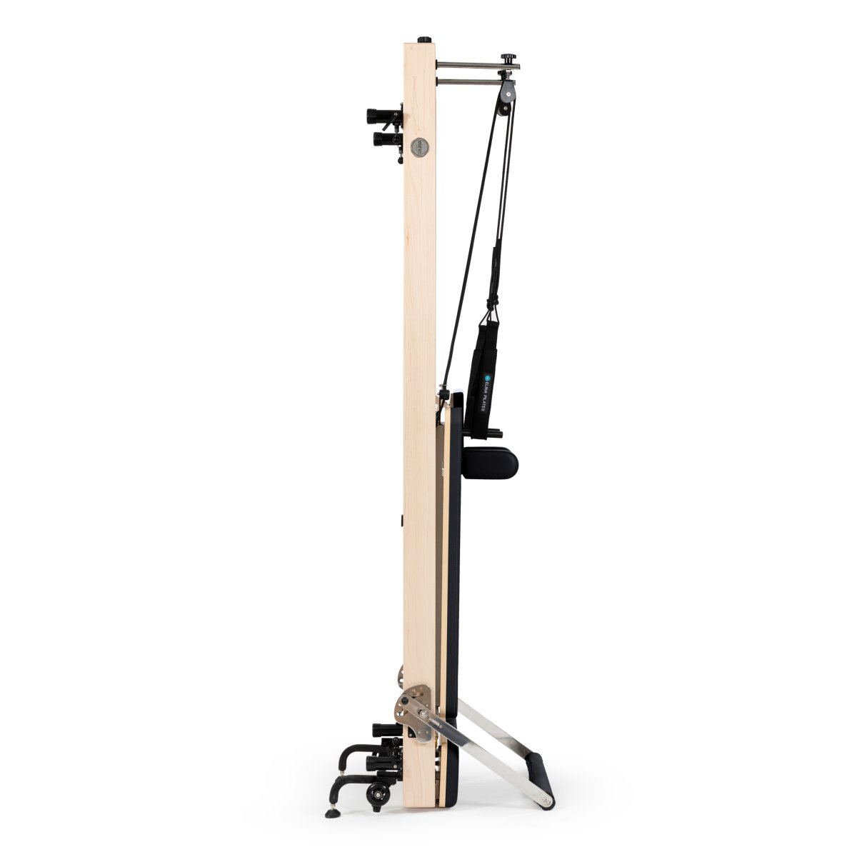 Elina Pilates Vertical Reformer made with American maple wood. A professional-grade, space-saving pilates machine that stores vertically, featuring an ultra-quiet carriage and adjustable springs. Available at The Kind Motion.