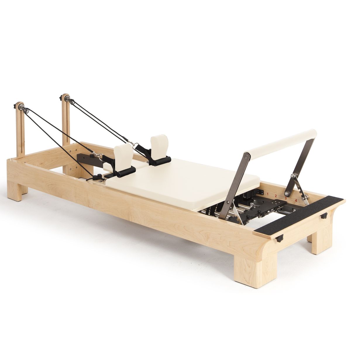 Elina Pilates Wooden Reformer Bundle in rock maple featuring an ultra-silent carriage and adjustable height pulleys. Includes jump board and box. Official authorized dealer The Kind Motion.