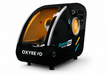 OxyRevo Space 60 black hyperbaric chamber on a clean white studio background